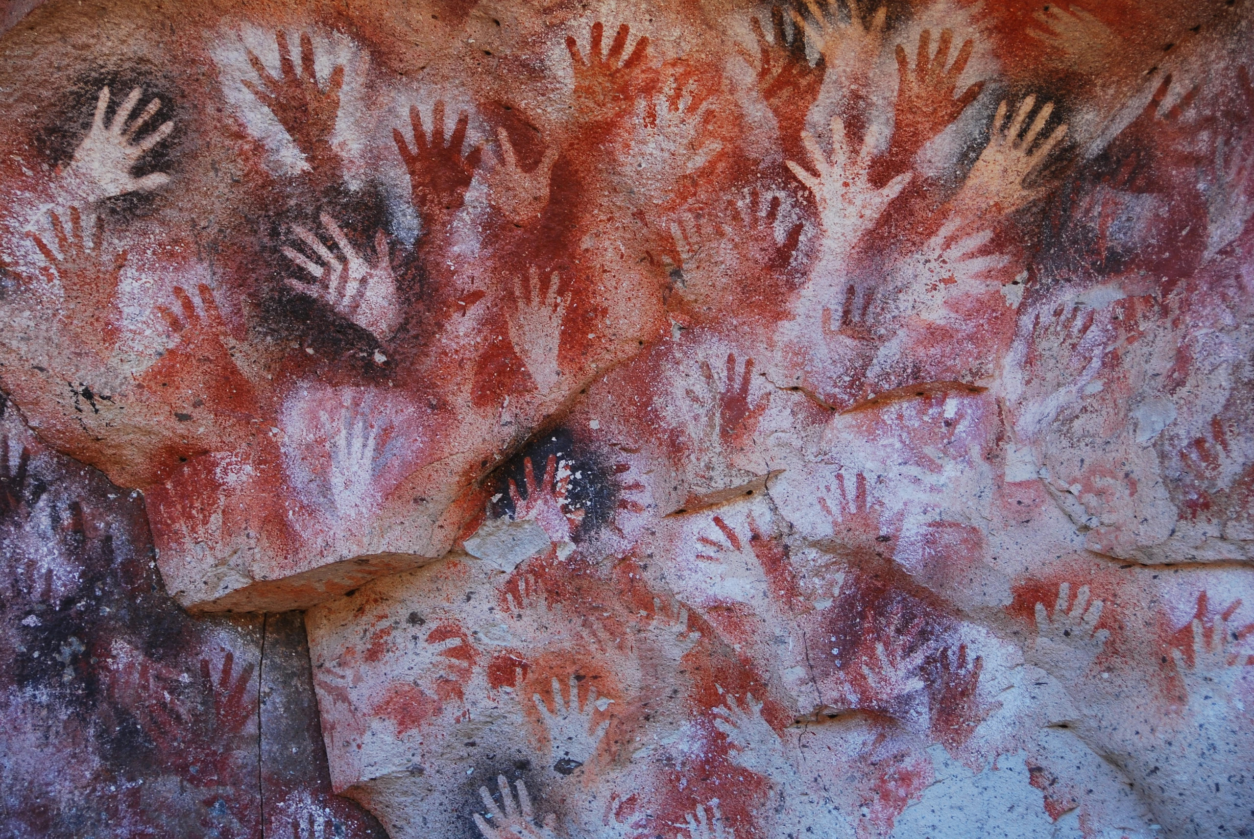 Händer på klippvägg vid Cueva De Las Manos, Argentina