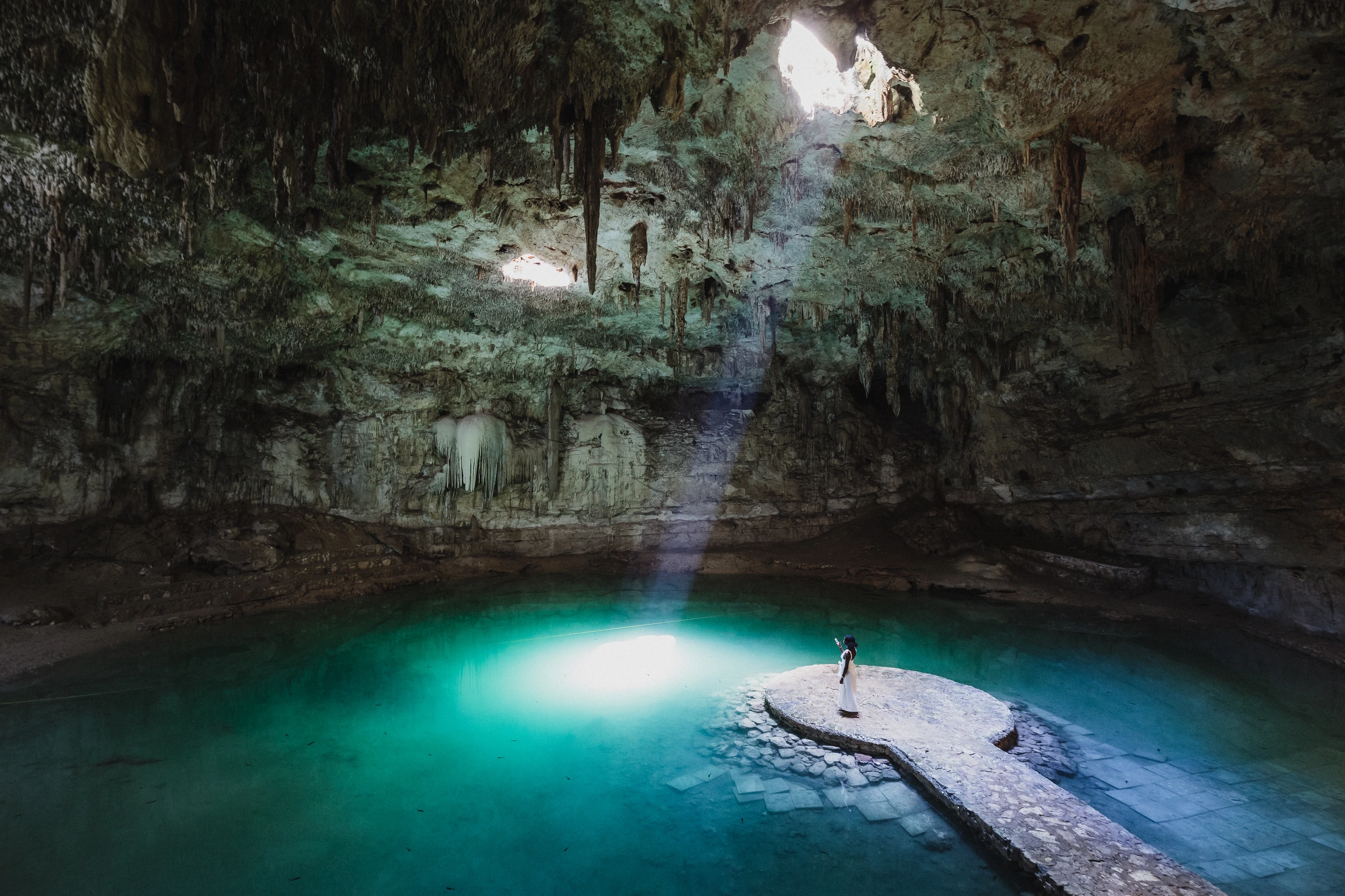 Solstråle i cenote, Mexiko